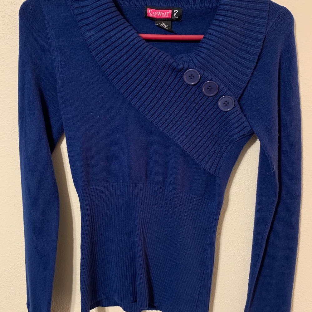 Blue sweater. Also have in pink.